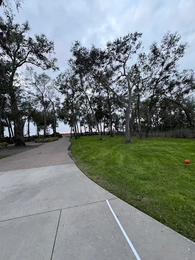 Park-like property with mature oaks and a manicured lawn